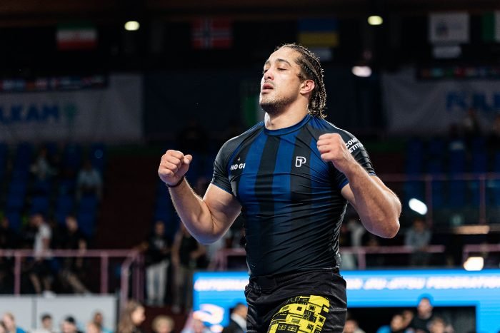 Moe celebrating a win at a no-gi jiu jitsu competition